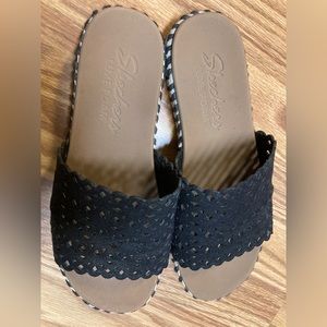 Skechers slides black lace.
